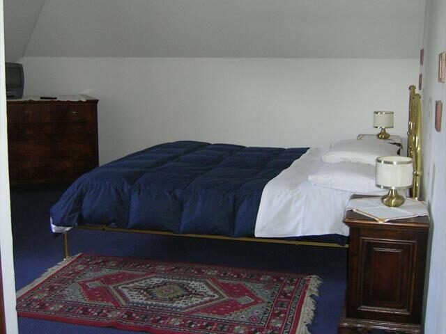 Camera doppia dell'Albergo San Cristoforo con letto matrimoniale